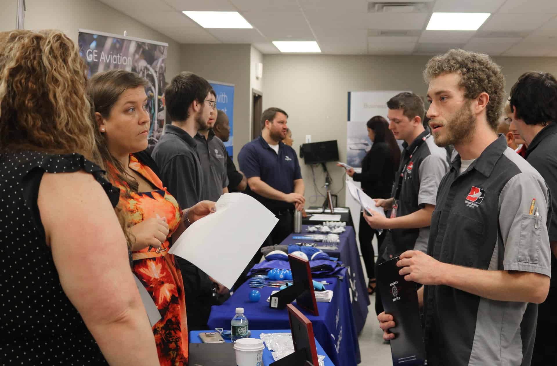 An NAA-New England student speaks with recruiters